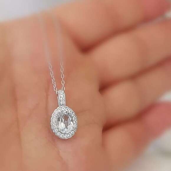 Diamond halo around Sky Blue Topaz pendant necklace - Picture 7 of 9